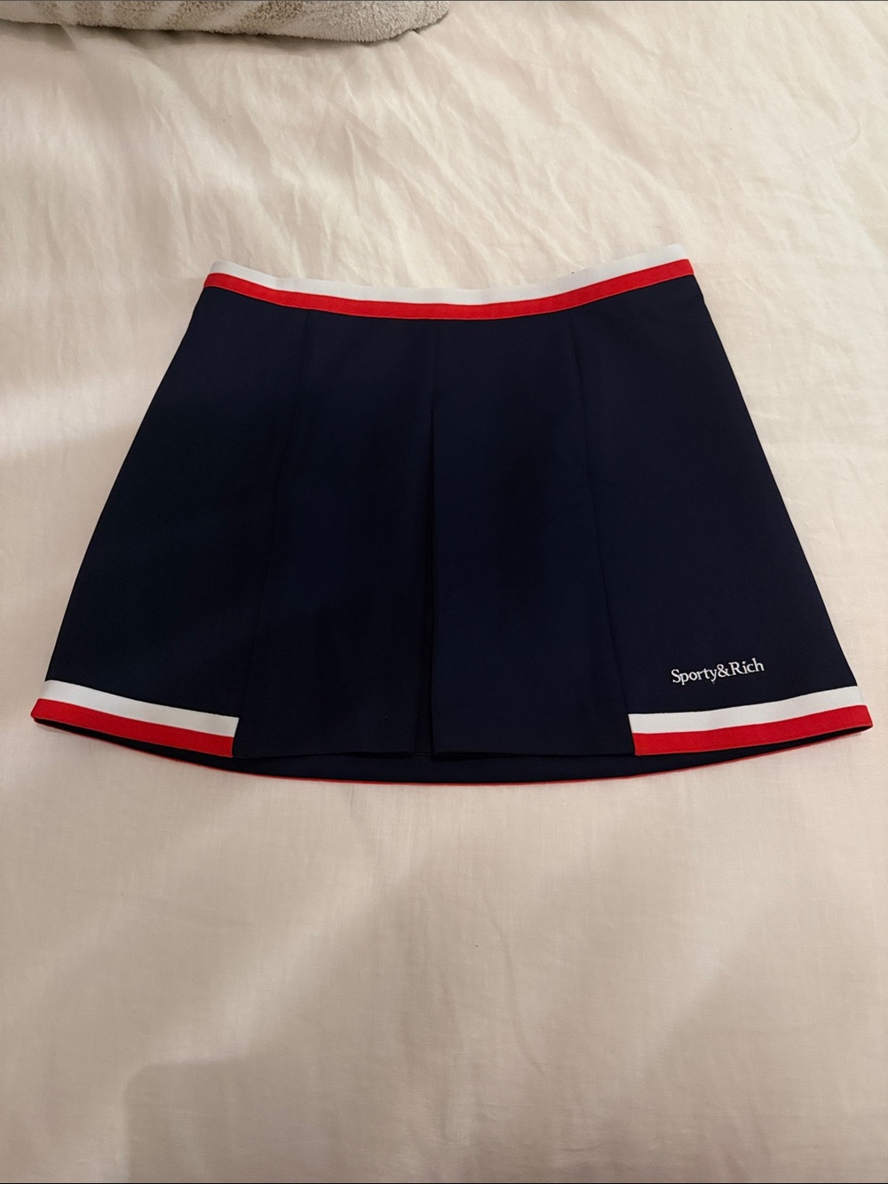 Sporty & Rich Navy Pleated Micro Mini Skirt with Red and White Trim